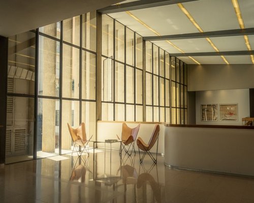 A clean workspace table inside an urban office building located in Mexico City